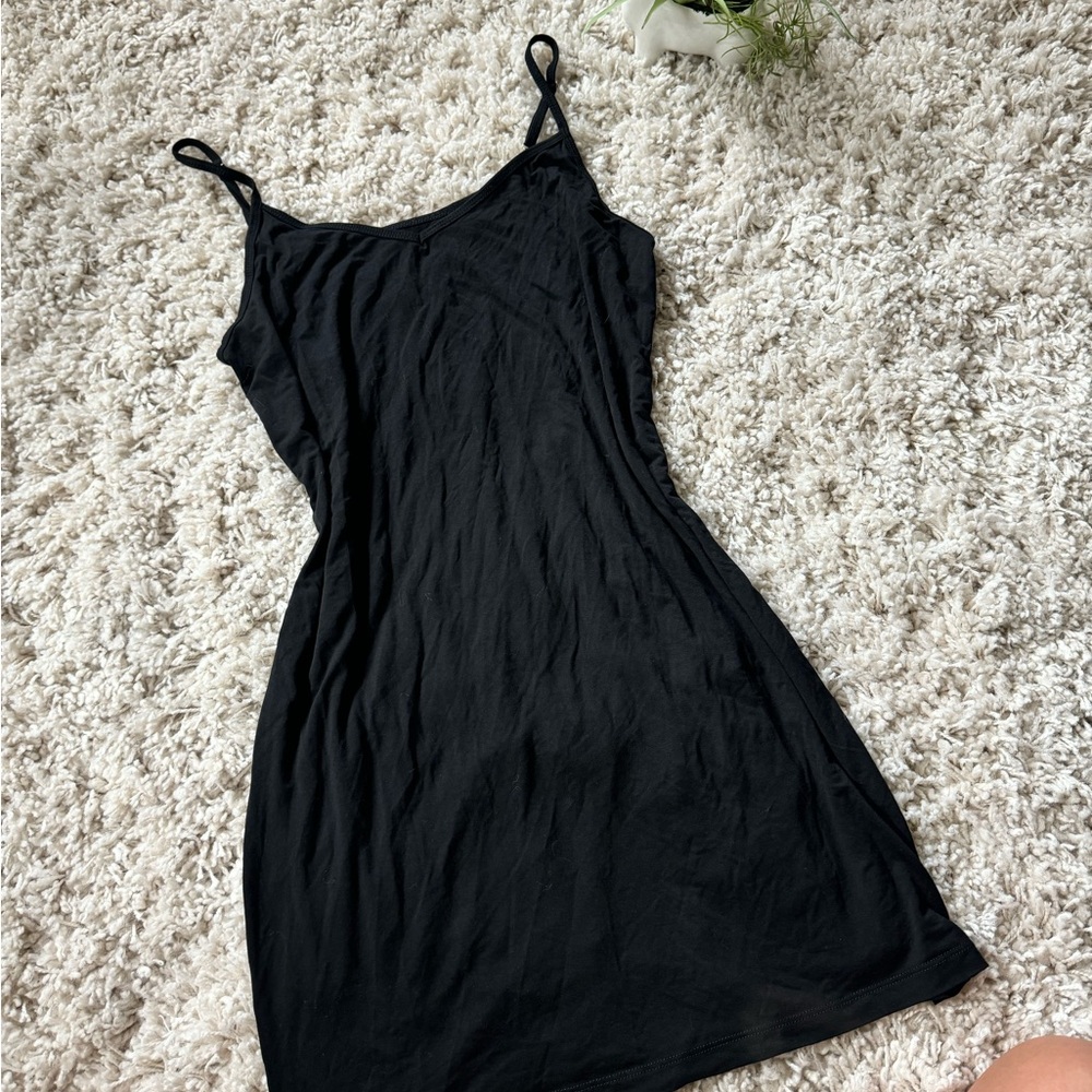Little black slip dress with adjustable straps and flowy simple casual d…